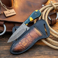 Damascus Basilisk Skinner Knife – Hand-Forged Drop Point Blade with Green & Yellow Composite Handle