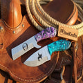 Canyon Ridge Cowboy Skinner knife Set of 2 Purple & Blue Resin Handle Skull Cowboy Engraved Full Tang