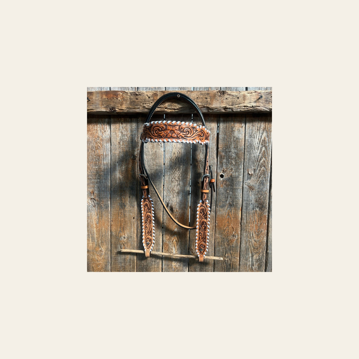 Light Oil Floral Tooled with White Whipstitch Browband Headstall / Bridle on a warm cream background