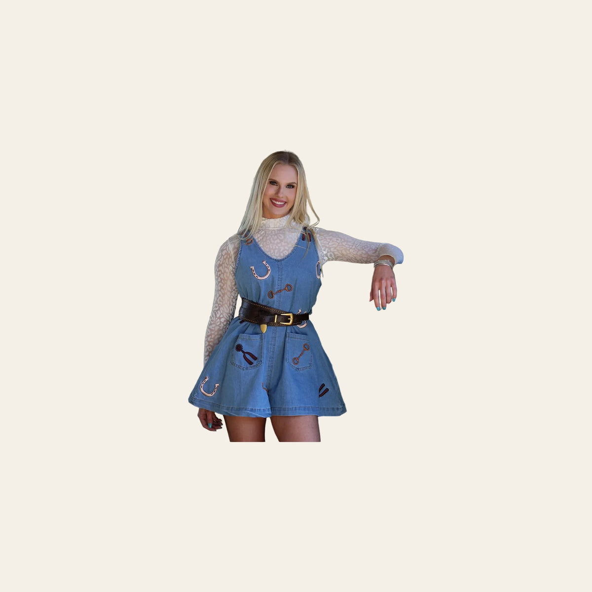 Lucky Spur | Romper on a warm cream background