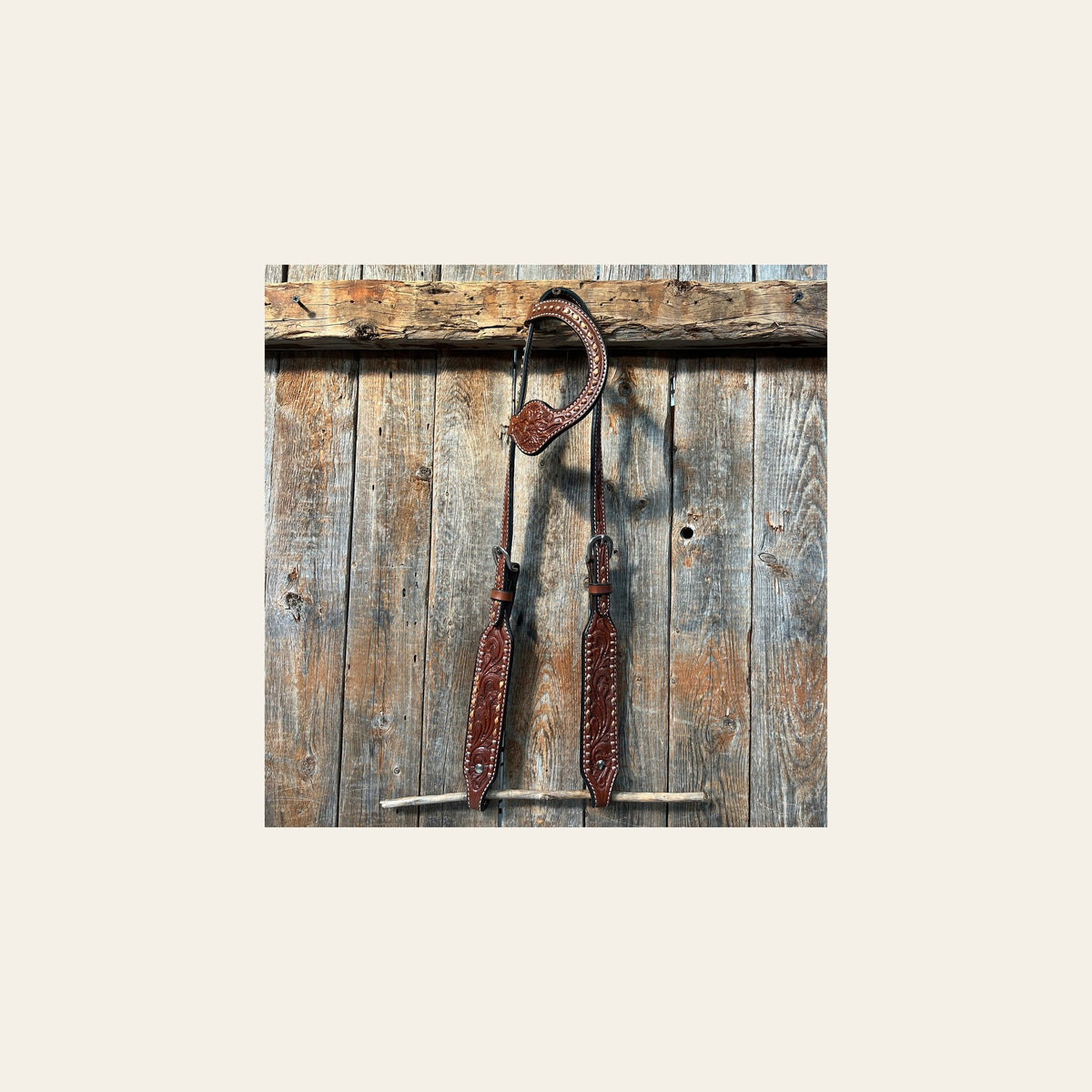 Medium Oil Floral Tooled Copper Buckstitching & Dots One Ear Headstall / Bridle on a warm cream background