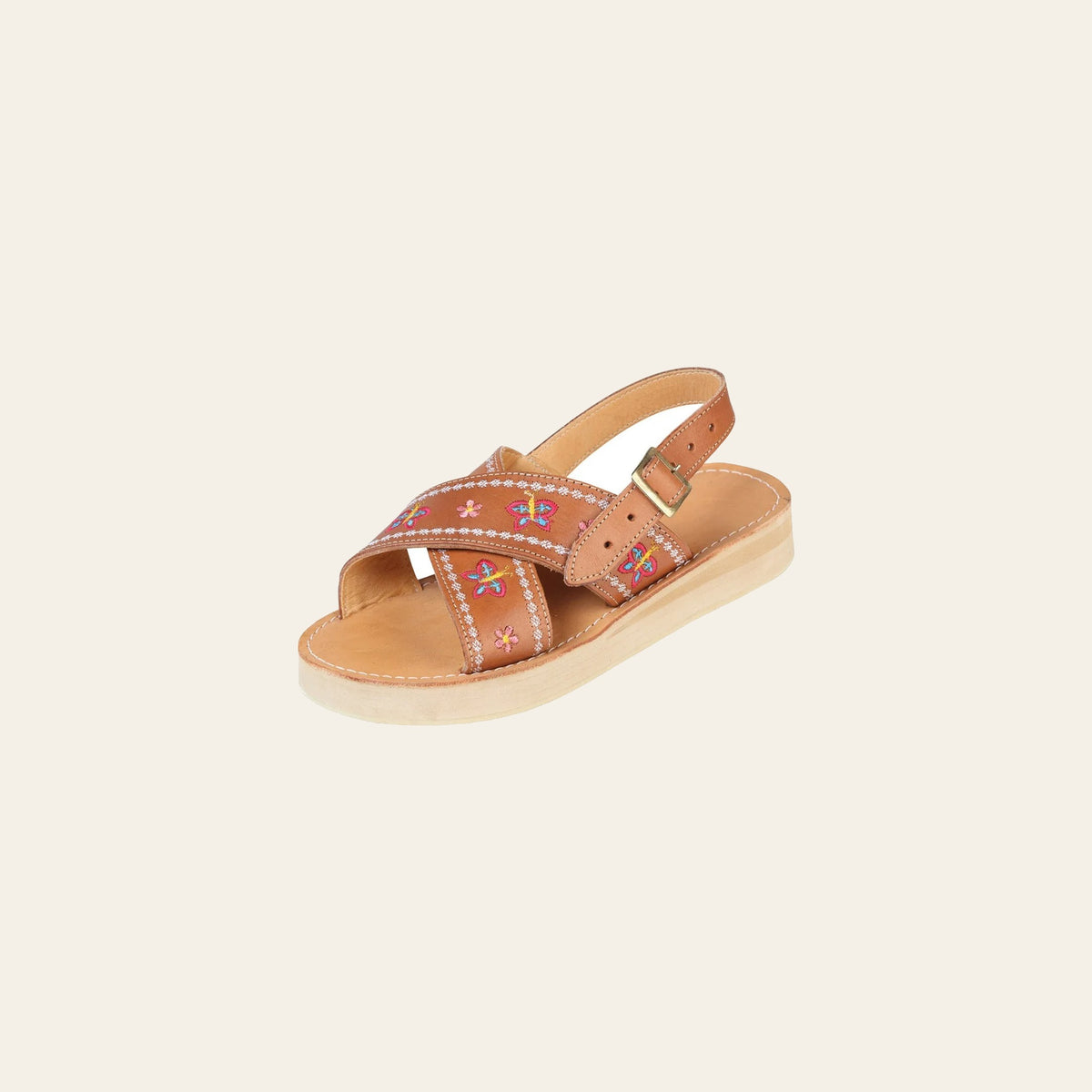 Mexica Artisanal Sandals Leather Tang 603928 on a warm cream background