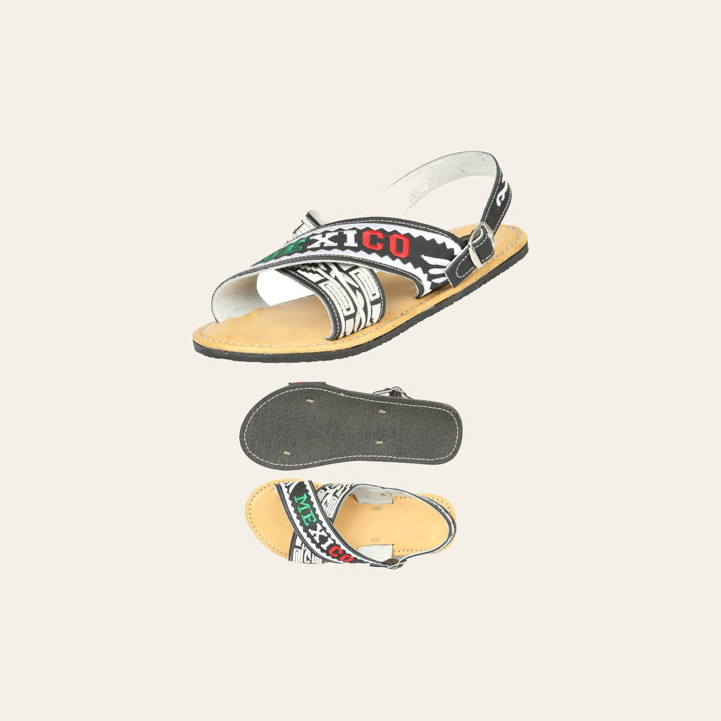 Mexican Artisanal Sandals 50% Leather, 50% Synthetic - White & Black 604033 on a warm cream background