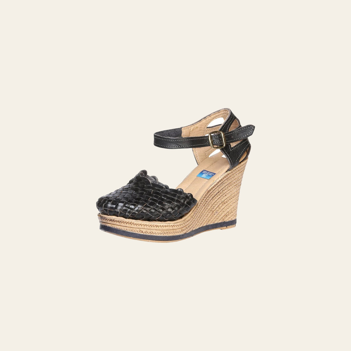 Mexican Artisanal Sandals Leather Black 601928 on a warm cream background
