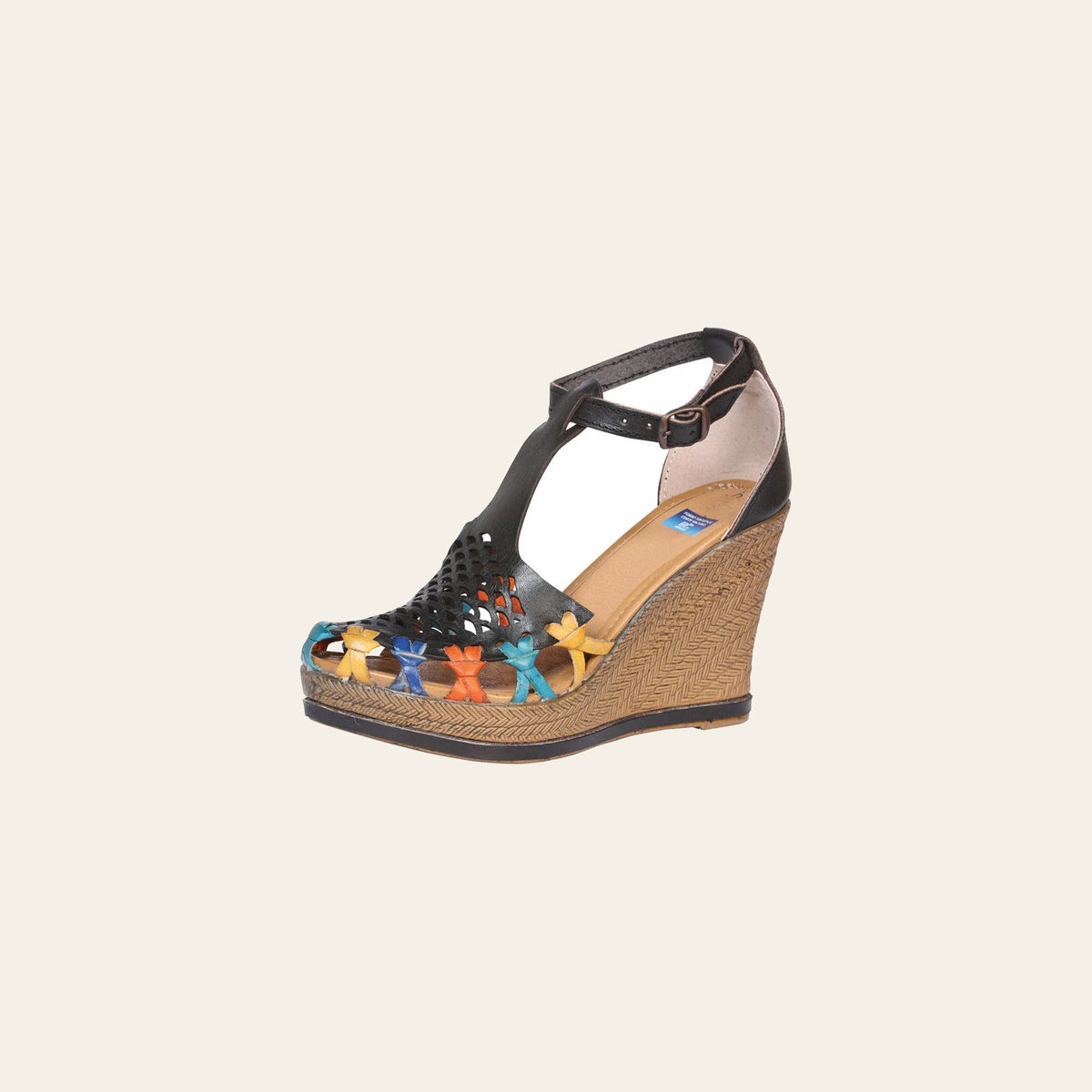Mexican Artisanal Sandals Leather Black 601937 on a warm cream background