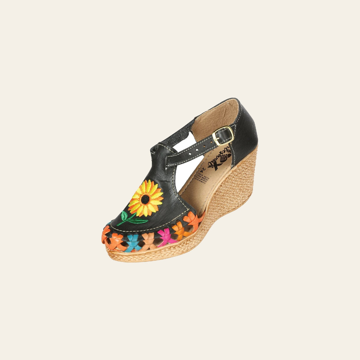 Mexican Artisanal Sandals Leather Black 603313 on a warm cream background