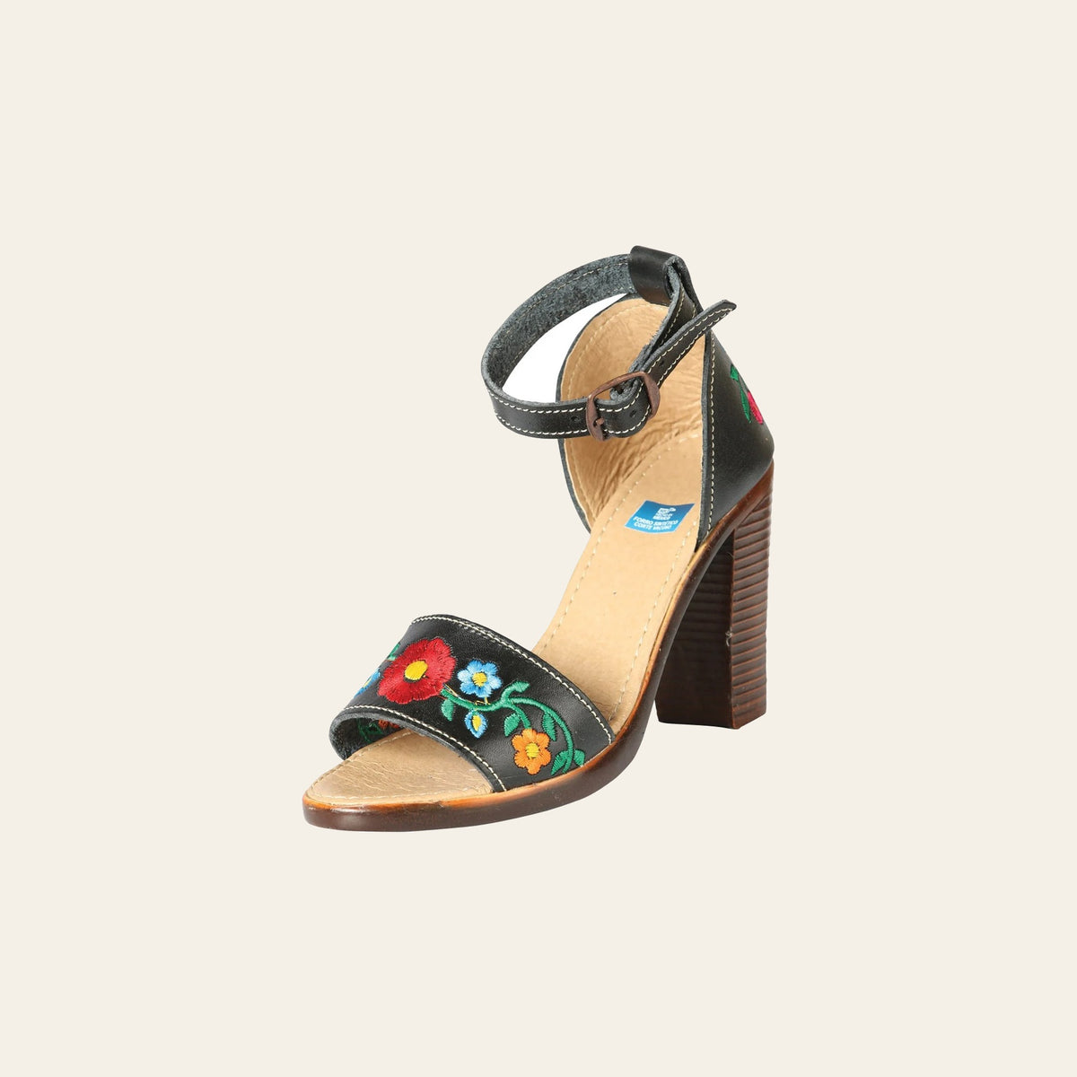 Mexican Artisanal Sandals Leather Black 603952 on a warm cream background