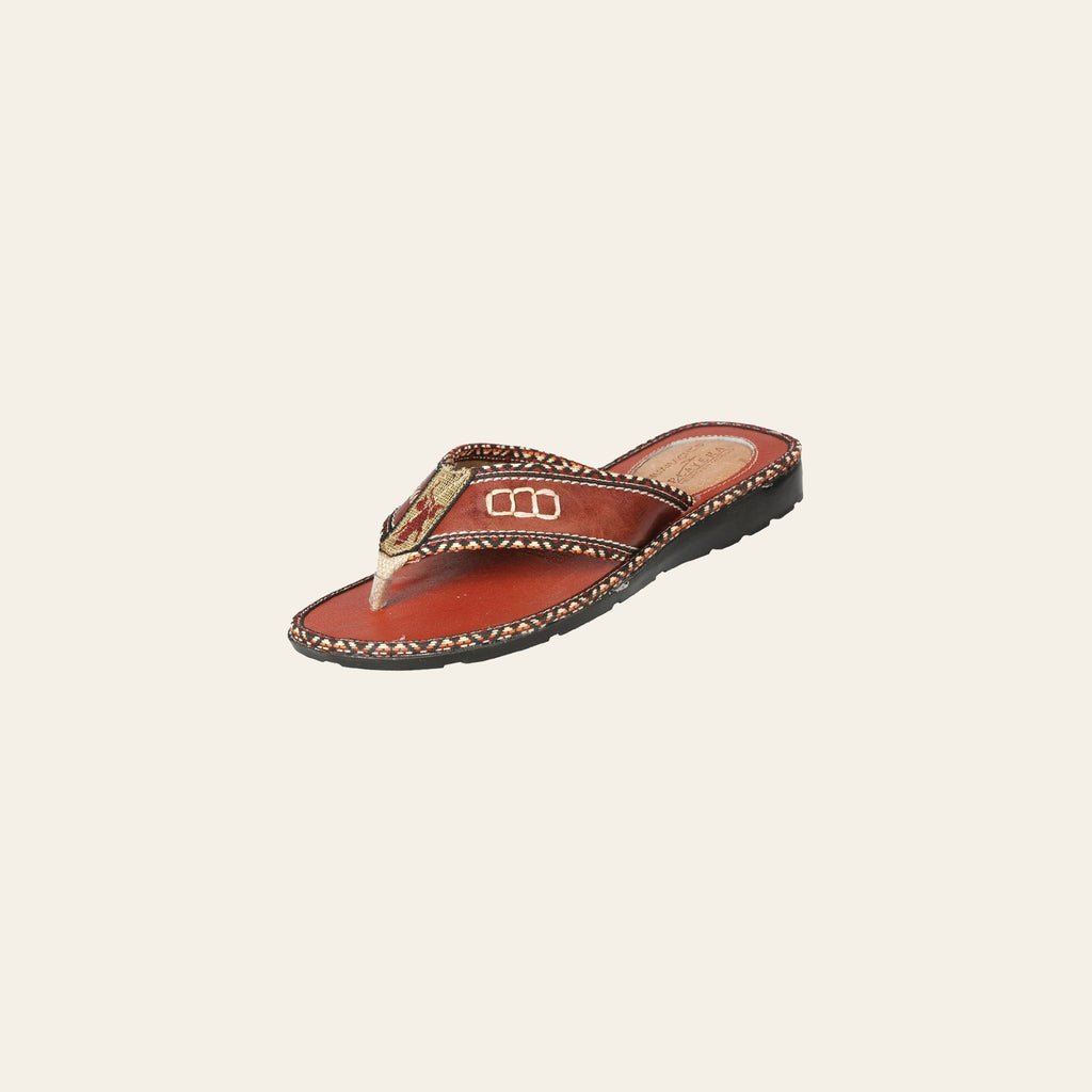 Mexican Artisanal Sandals Leather Shedron 602981 on a warm cream background