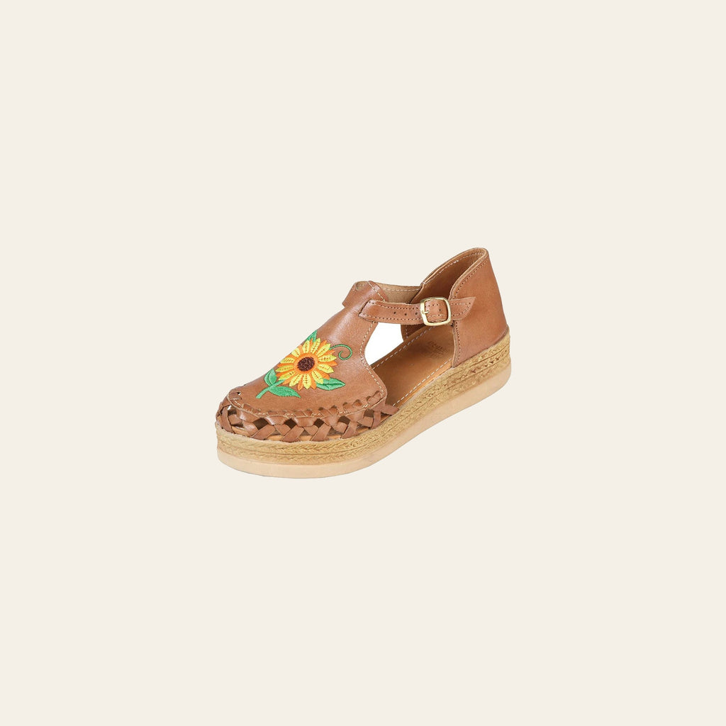 Mexican Artisanal Sandals Leather Tang 603922 on a warm cream background