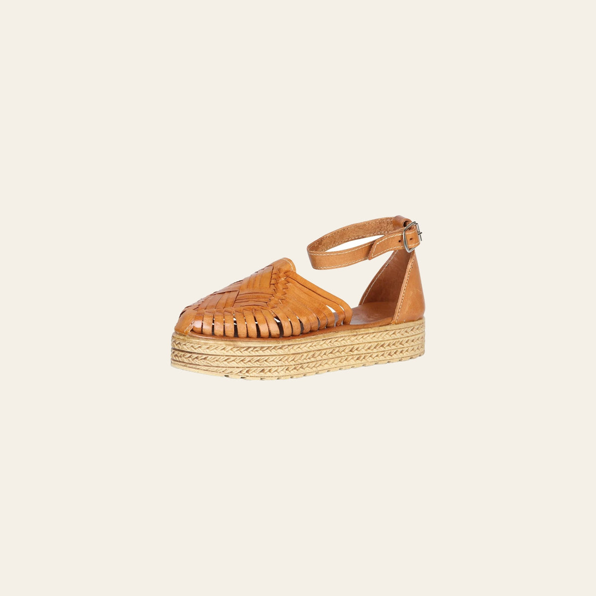 Mexican Artisanal Sandals Leather Tang 603923 on a warm cream background