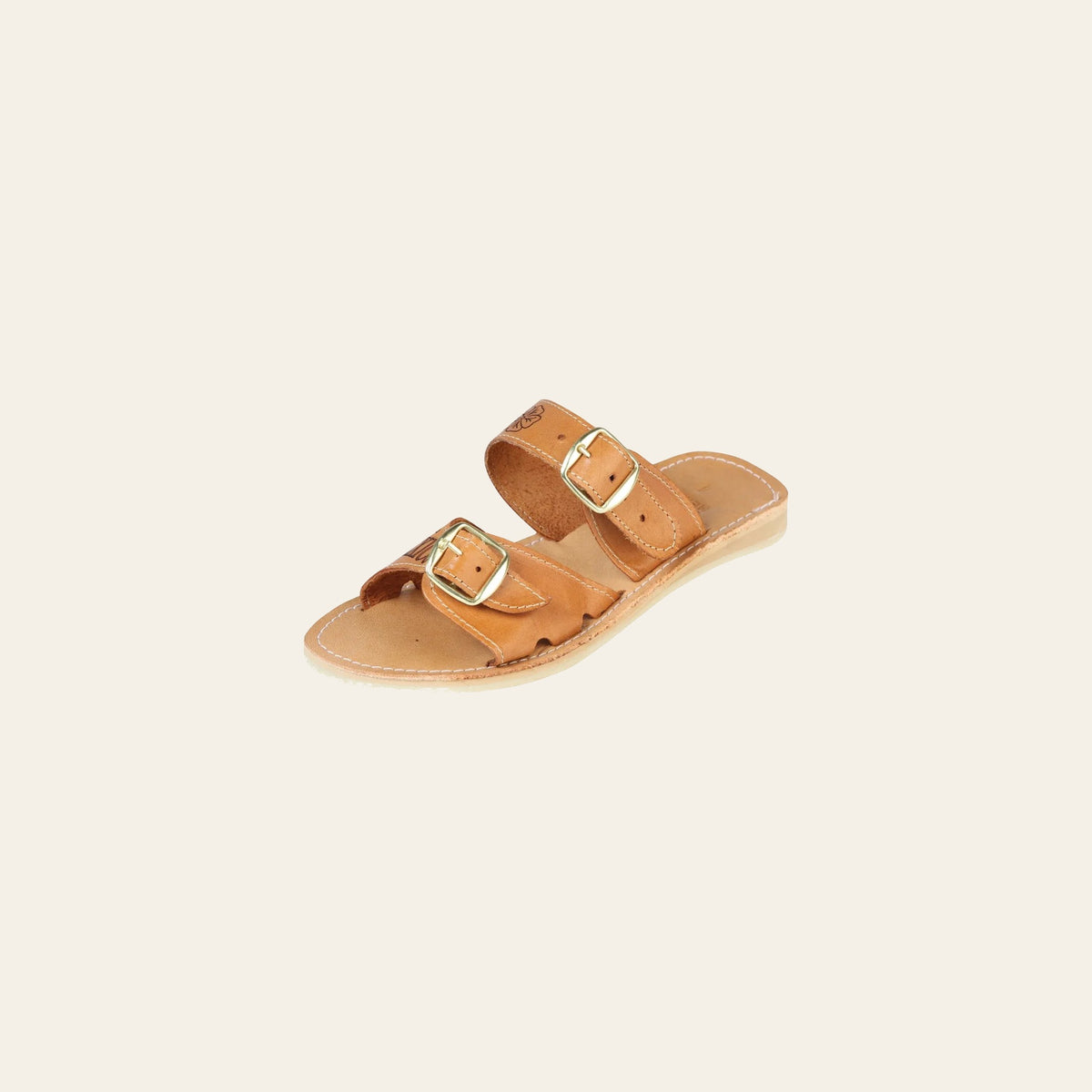 Mexican Artisanal Sandals Leather Tang 603925 on a warm cream background