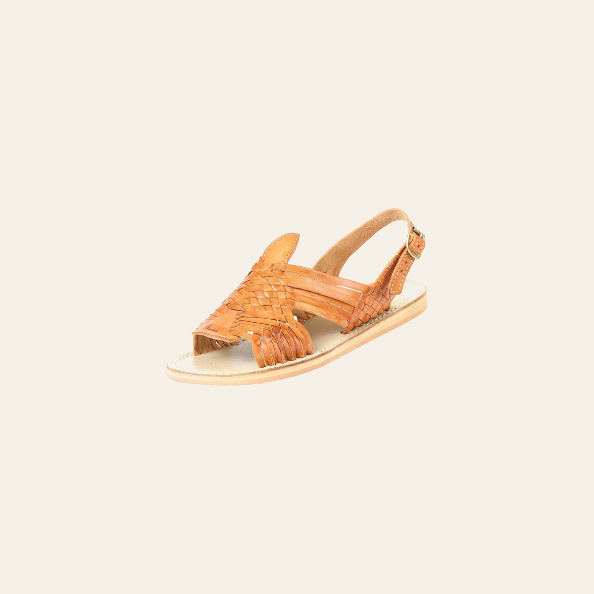 Mexican Artisanal Sandals Leather Tang 604017 on a warm cream background