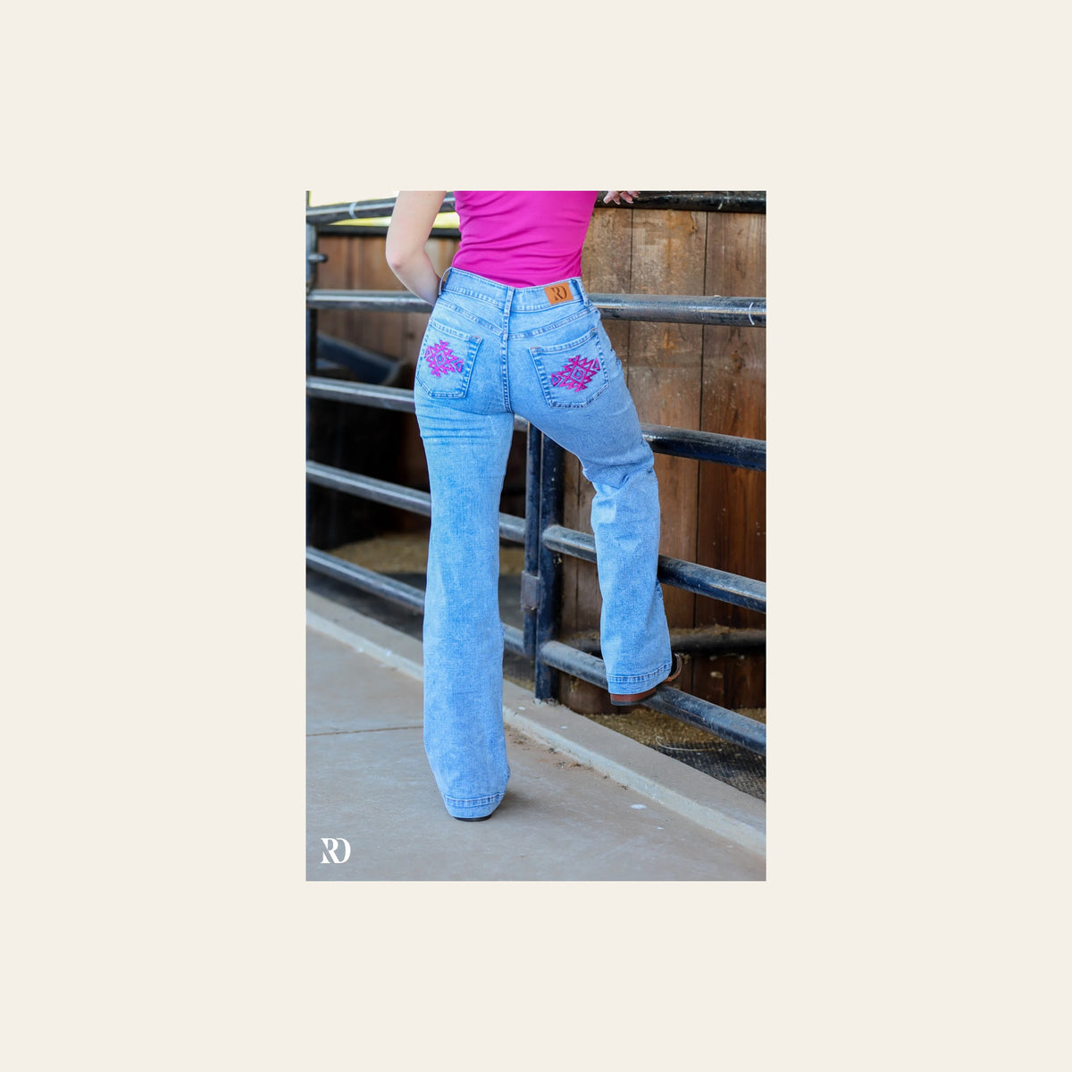 Mia Trousers - Acid Wash Pink Pocket on a warm cream background