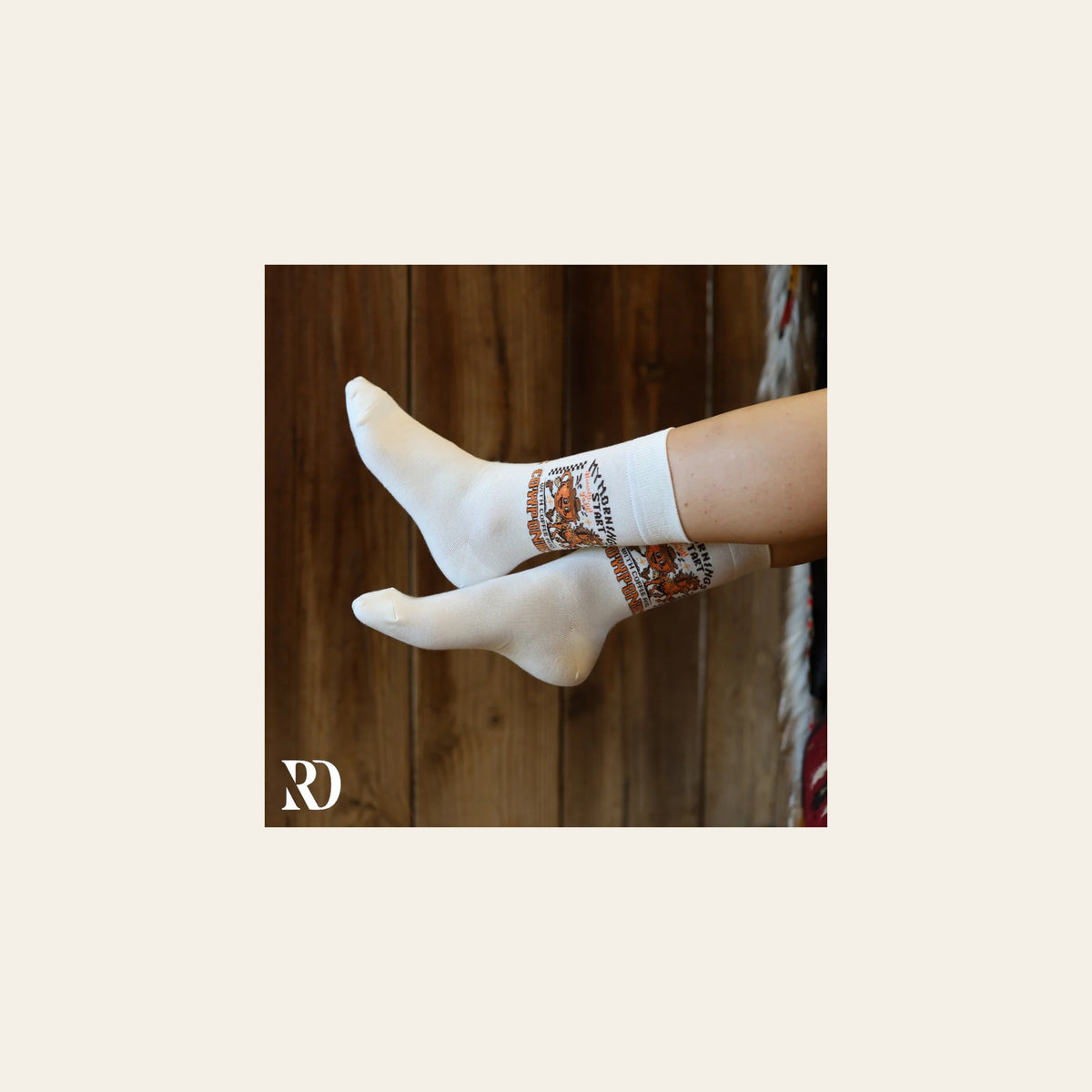 My Mornings Start With Coffee & Cowponies Socks on a warm cream background