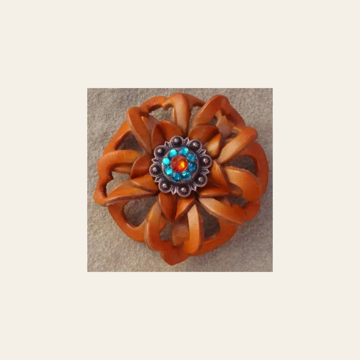 Orange Lotus Flower With Copper Fire Opal & Teal 1" Concho on a warm cream background