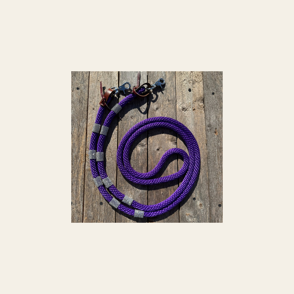 Purple Nylon Barrel Racing Reins with Rhinestones #BNR101 on a warm cream background