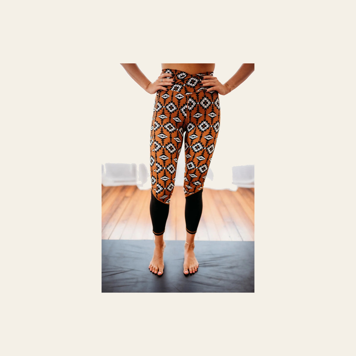 Sandstorm Crossover Leggings on a warm cream background