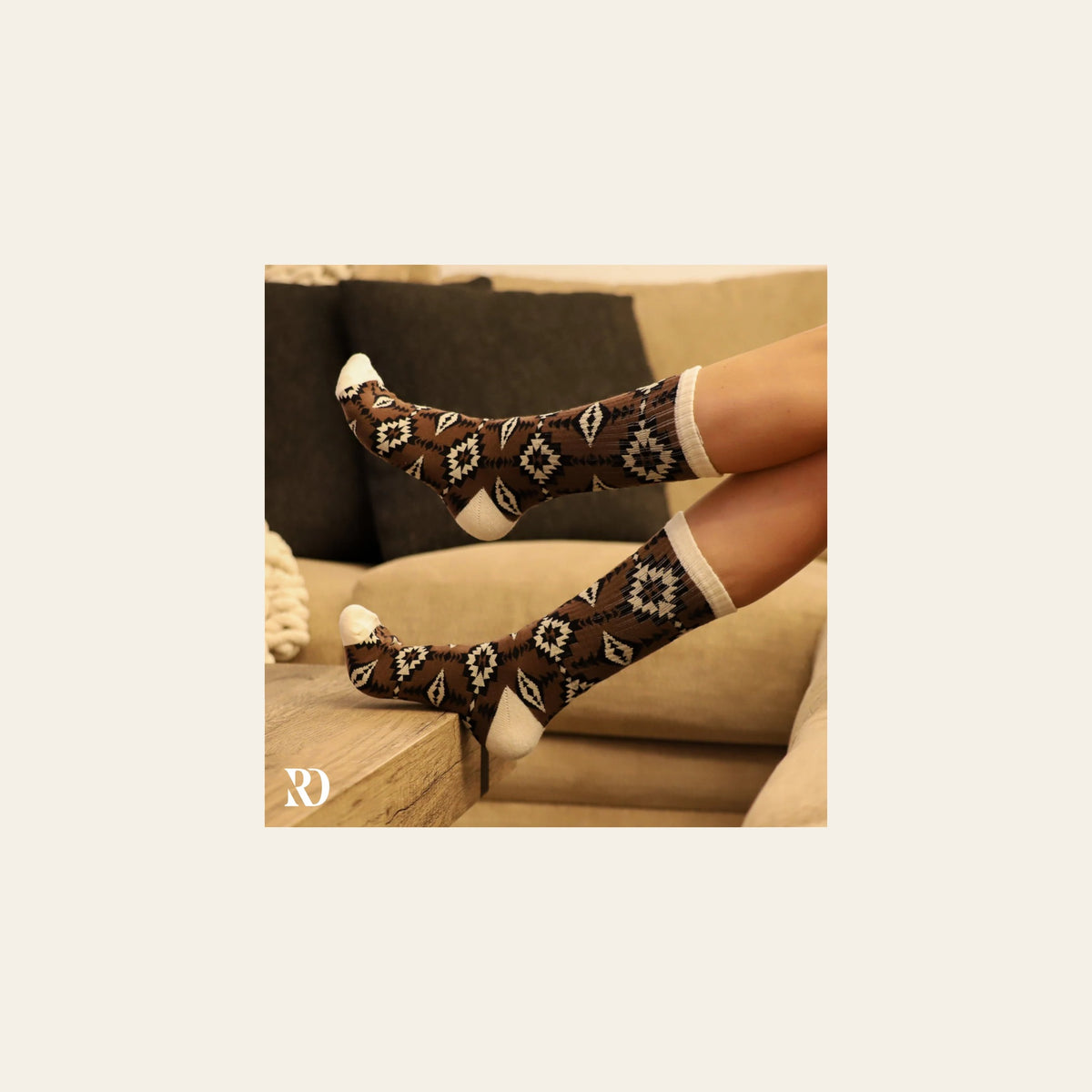 Sandstorm Socks on a warm cream background