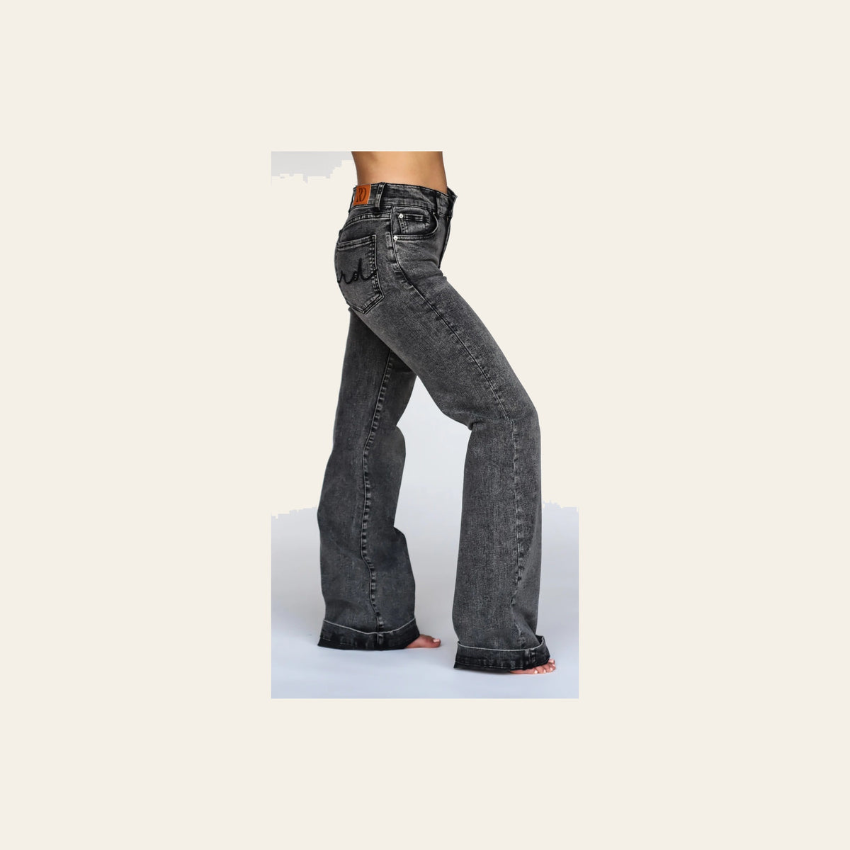 Smoke Signature Trouser Denim on a warm cream background