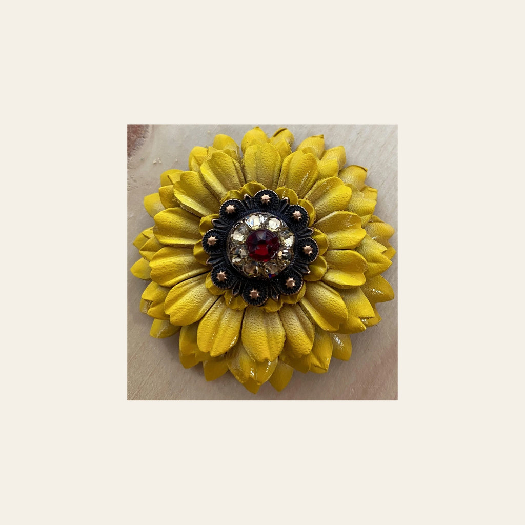 Sunflower With Copper Ruby & Champagne 1" Concho on a warm cream background