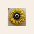 Sunflower With Copper Ruby & Champagne 1" Concho on a warm cream background