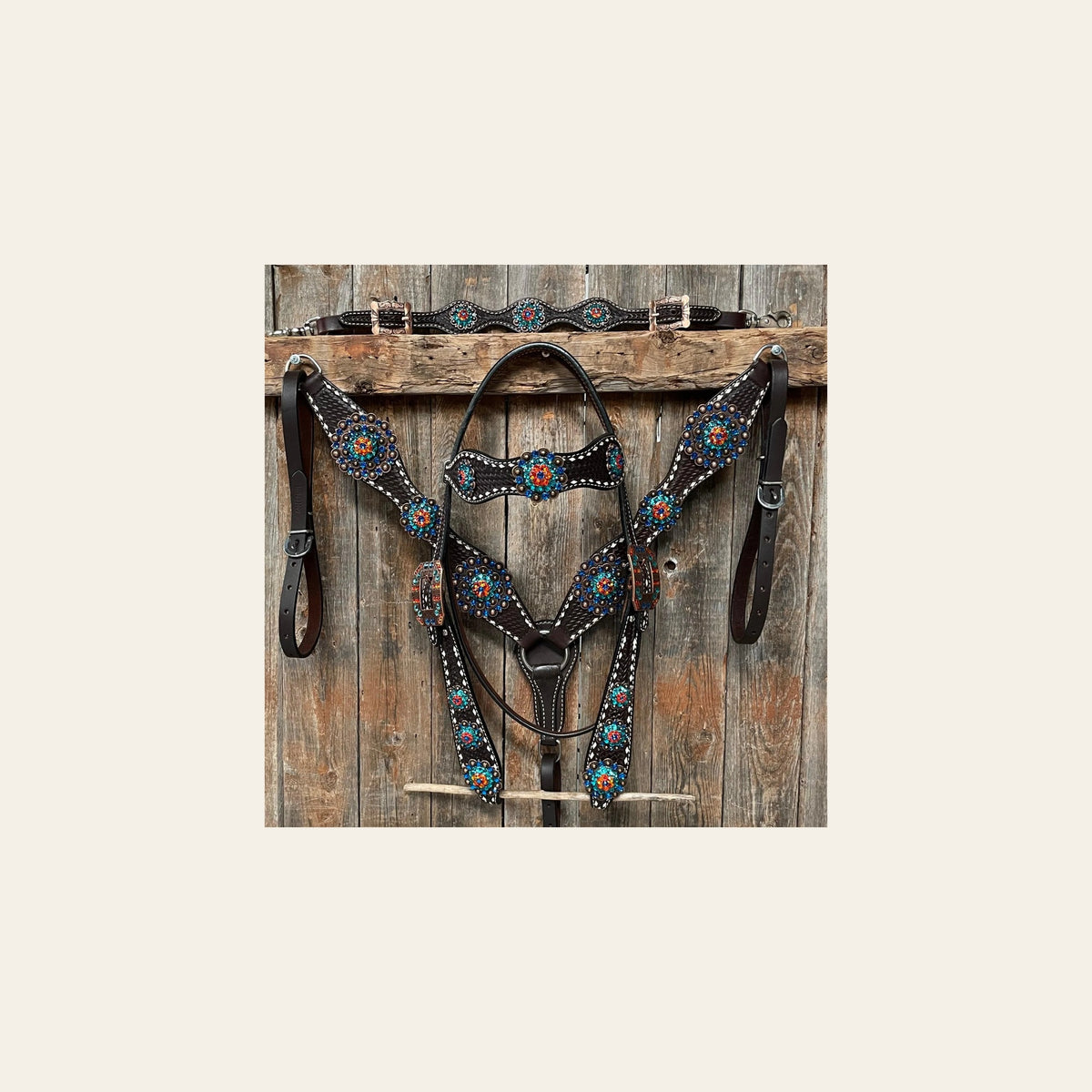 Dark Oil Buckstitch Capri/Fire Opal/Teal Browband/One Ear Tack Set with Wither Strap #BBBC471 on a warm cream background