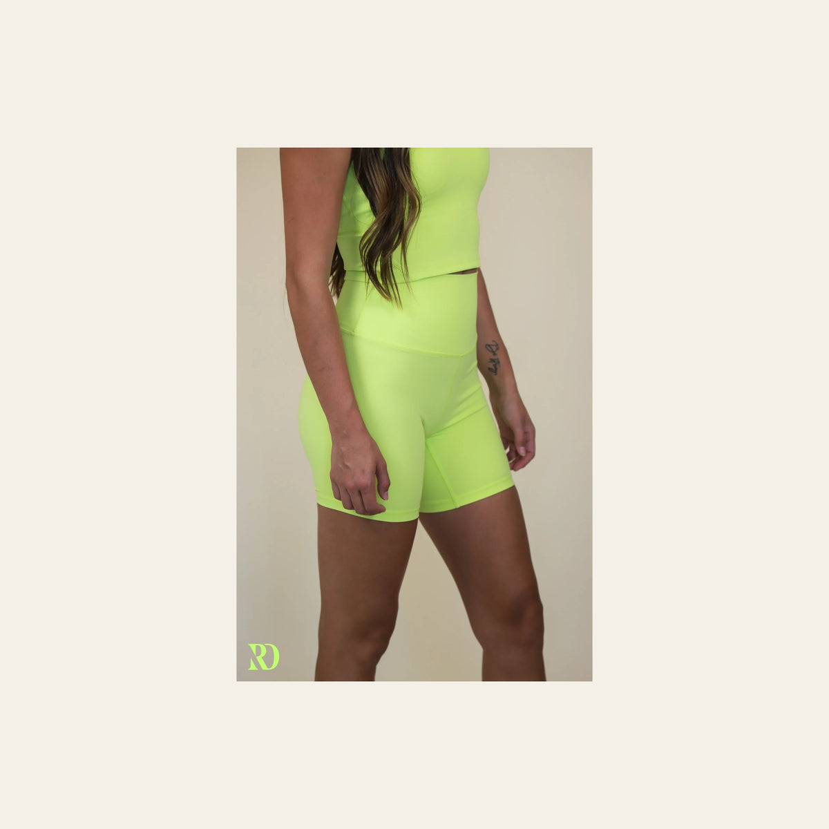 Vital Bike Shorts | Sol on a warm cream background