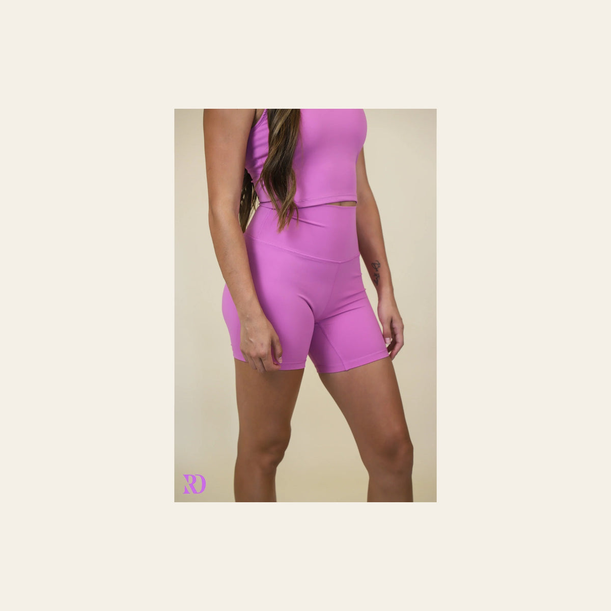 Vital Bike Shorts | Ultra Violet on a warm cream background