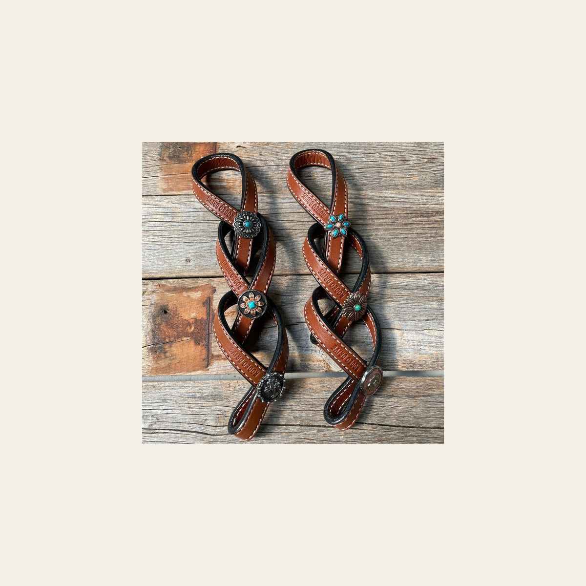 Western Medium Oil Rustic Tie Down Keepers on a warm cream background