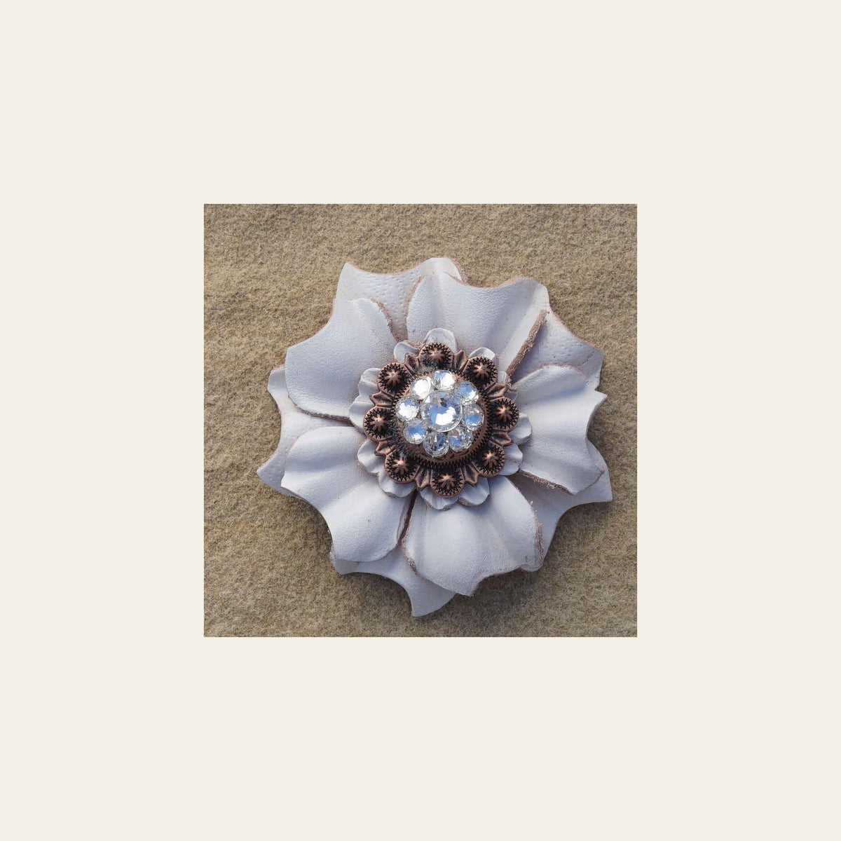 White Carnation Flower With Copper Clear 1" Concho on a warm cream background