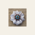 White Carnation Flower With Copper Topaz & Turquoise 1" Concho on a warm cream background