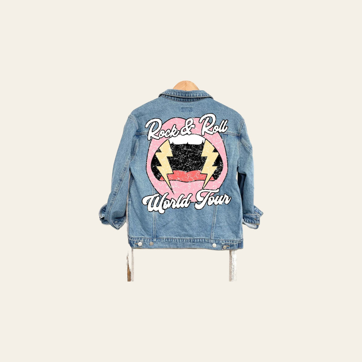 World Tour Graphic Denim Jacket on a warm cream background
