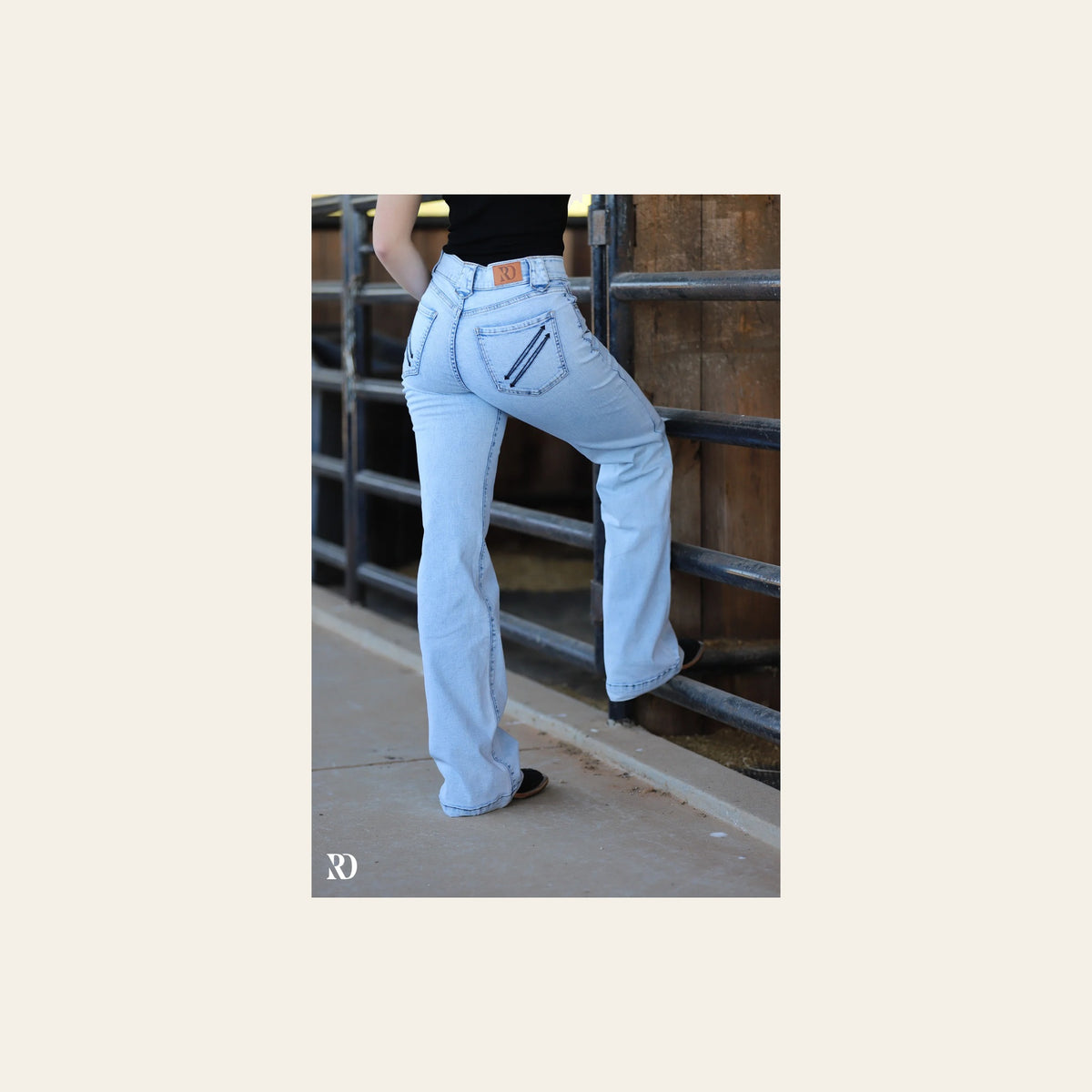 Yoakum Trousers - Light Wash Black Pocket on a warm cream background