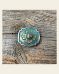 A Touch of Turquoise Concho 1" W109S on a warm cream background