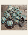A Touch of Turquoise Western Concho W109 on a warm cream background