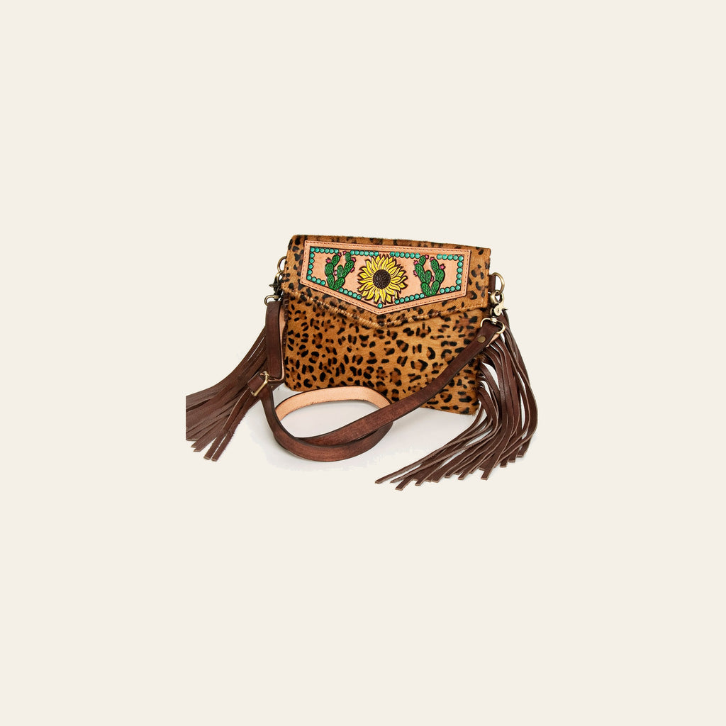 American Darling Women's Hand Tooled Floral Carved Leather Envelope with Hair-On Cowhide and Fringes