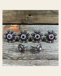 Antique Silver Amethyst & AB Saddle Conchos on a warm cream background