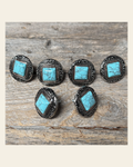Antique Silver and Copper Dot Turquoise Saddle Set SSW258 on a warm cream background
