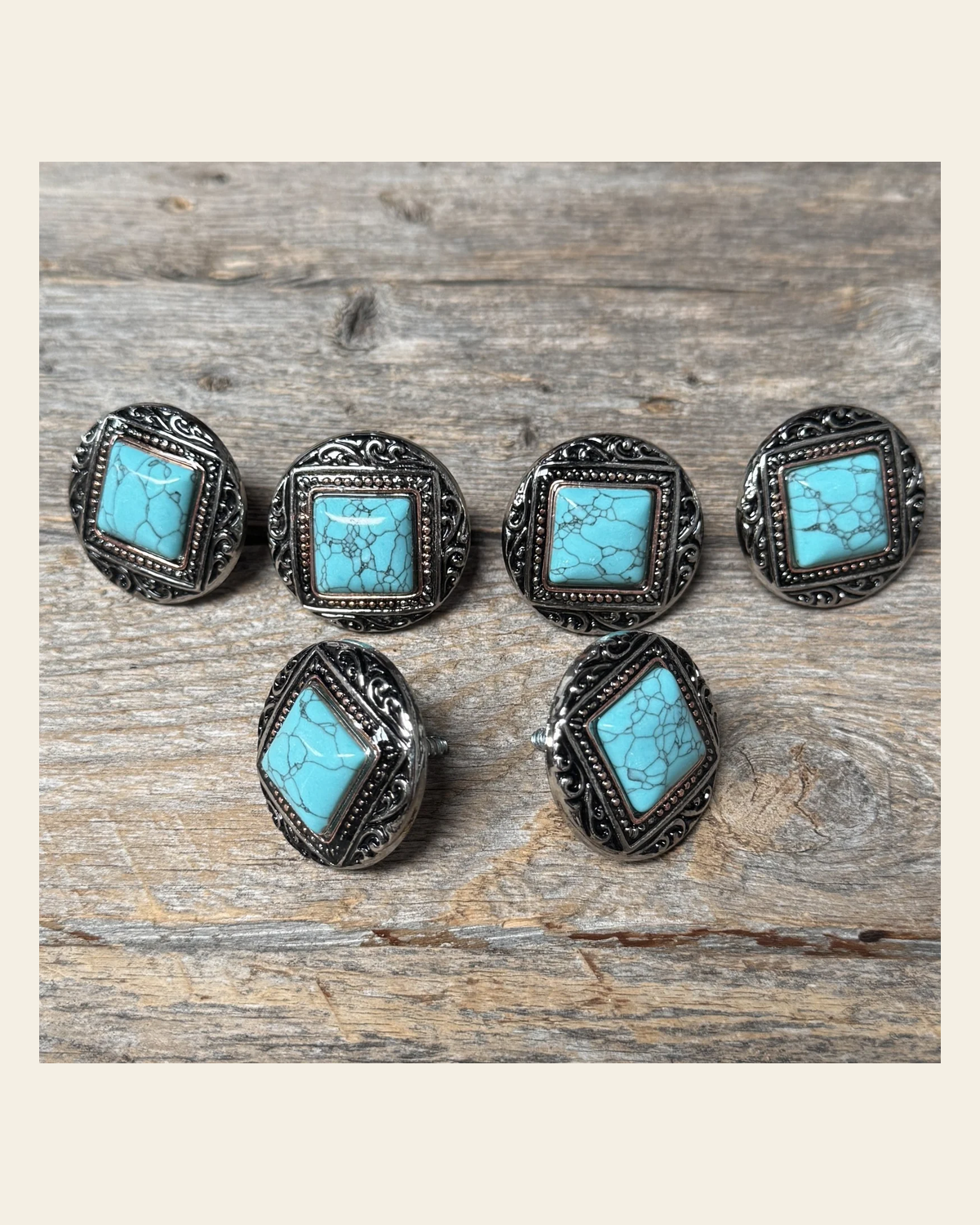 Antique Silver and Copper Dot Turquoise Saddle Set SSW258 on a warm cream background