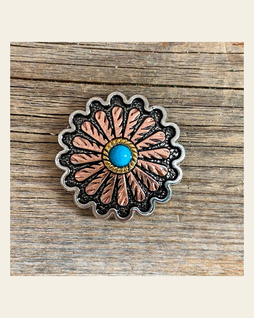 Antique Silver and Copper Floral Western Concho 1.25" W220L on a warm cream background