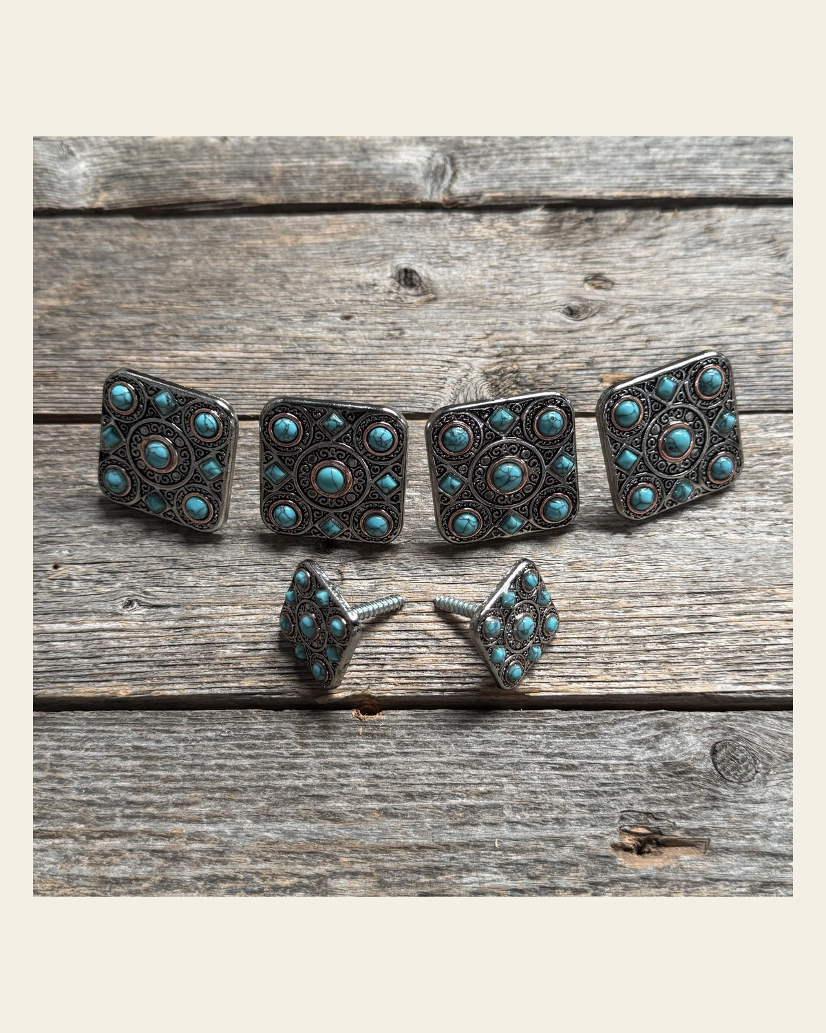 Antique Silver and Copper Square Turquoise Saddle Set SSW243 on a warm cream background