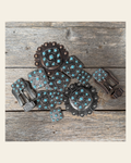 Antique Silver and Copper Square Turquoise Western Conchos W243 on a warm cream background