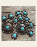 Antique Silver and Copper Turquoise Flower Concho W267 on a warm cream background