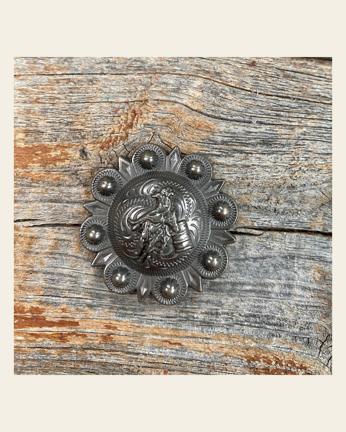 Antique Silver Barrel Racer Concho 1.5" W177L on a warm cream background
