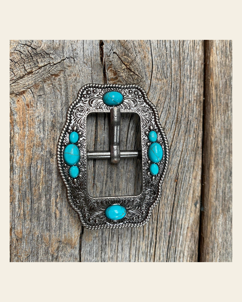 Antique Silver Cart Buckle with Turquoise Stones W198B on a warm cream background