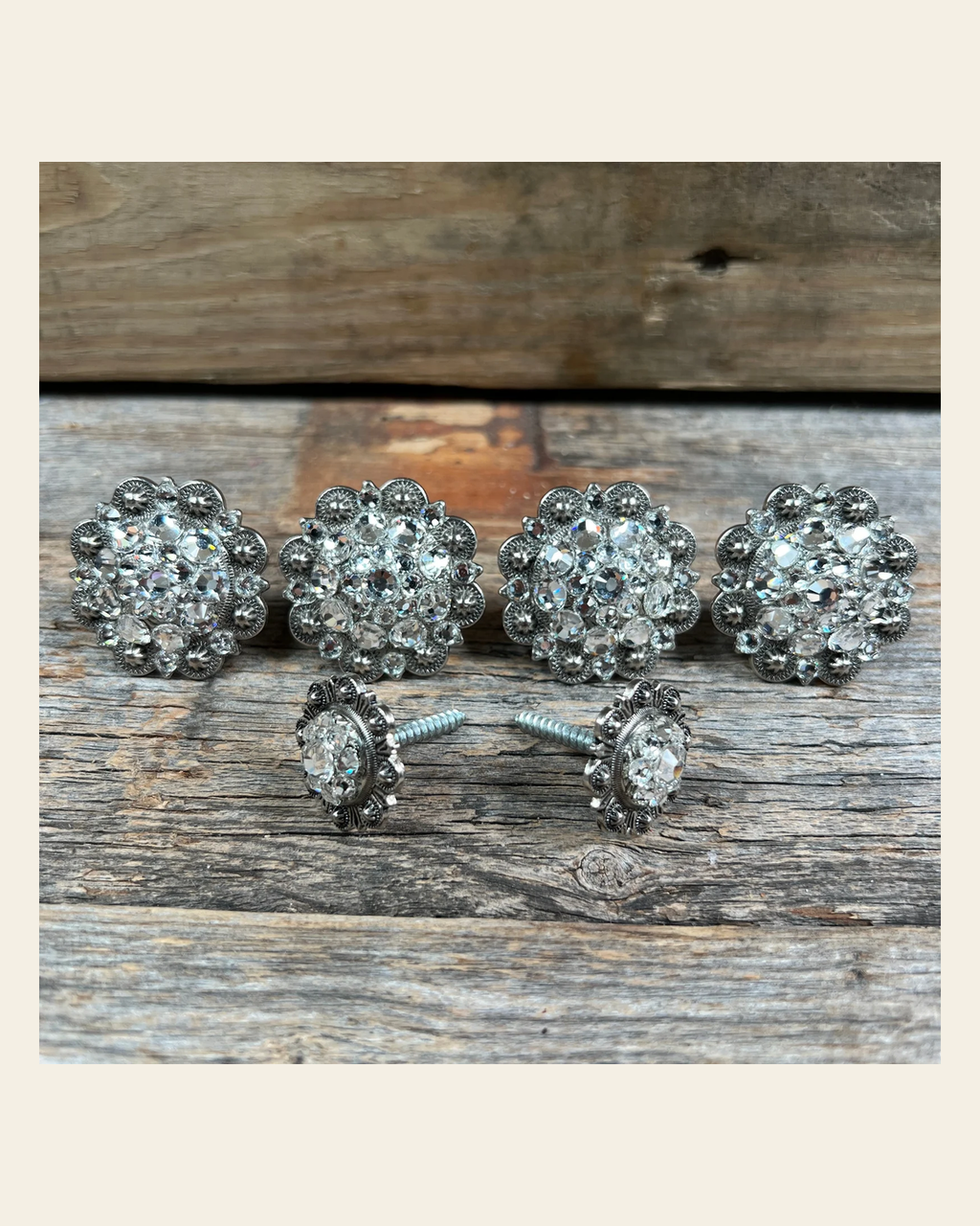 Antique Silver Clear Saddle Conchos on a warm cream background