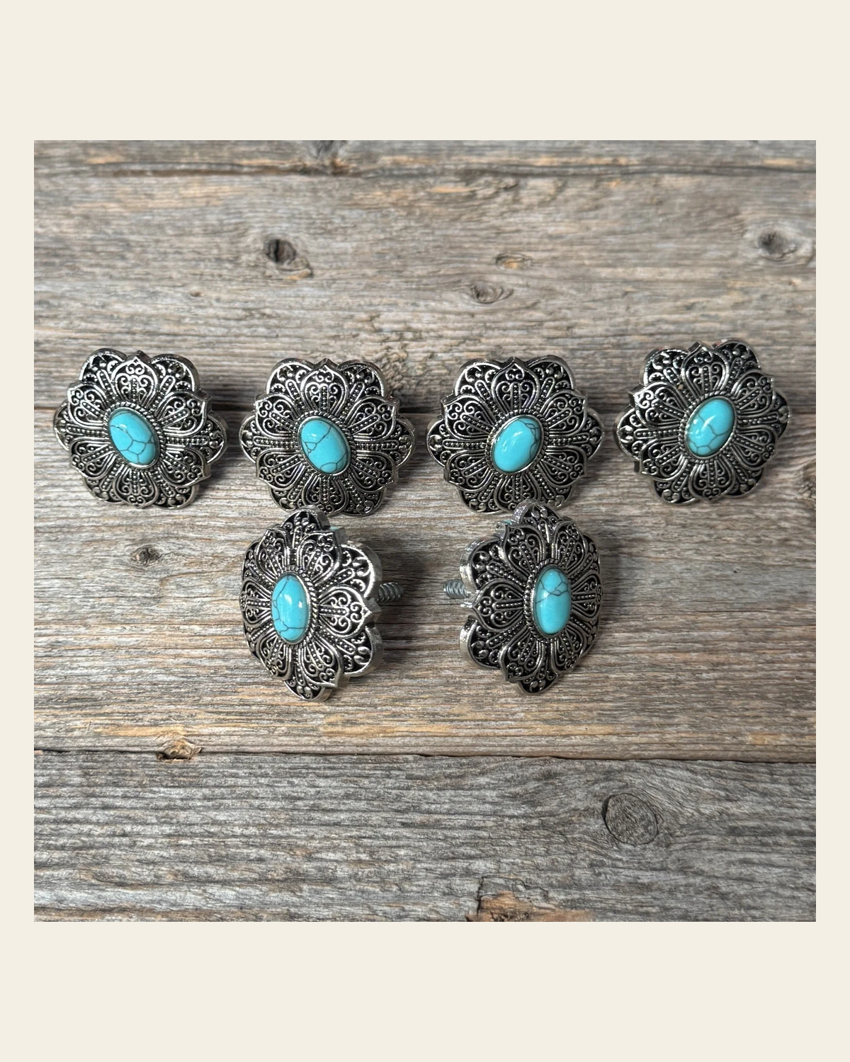 Antique Silver Filigree Floral Turquoise Saddle Set SSW234 on a warm cream background