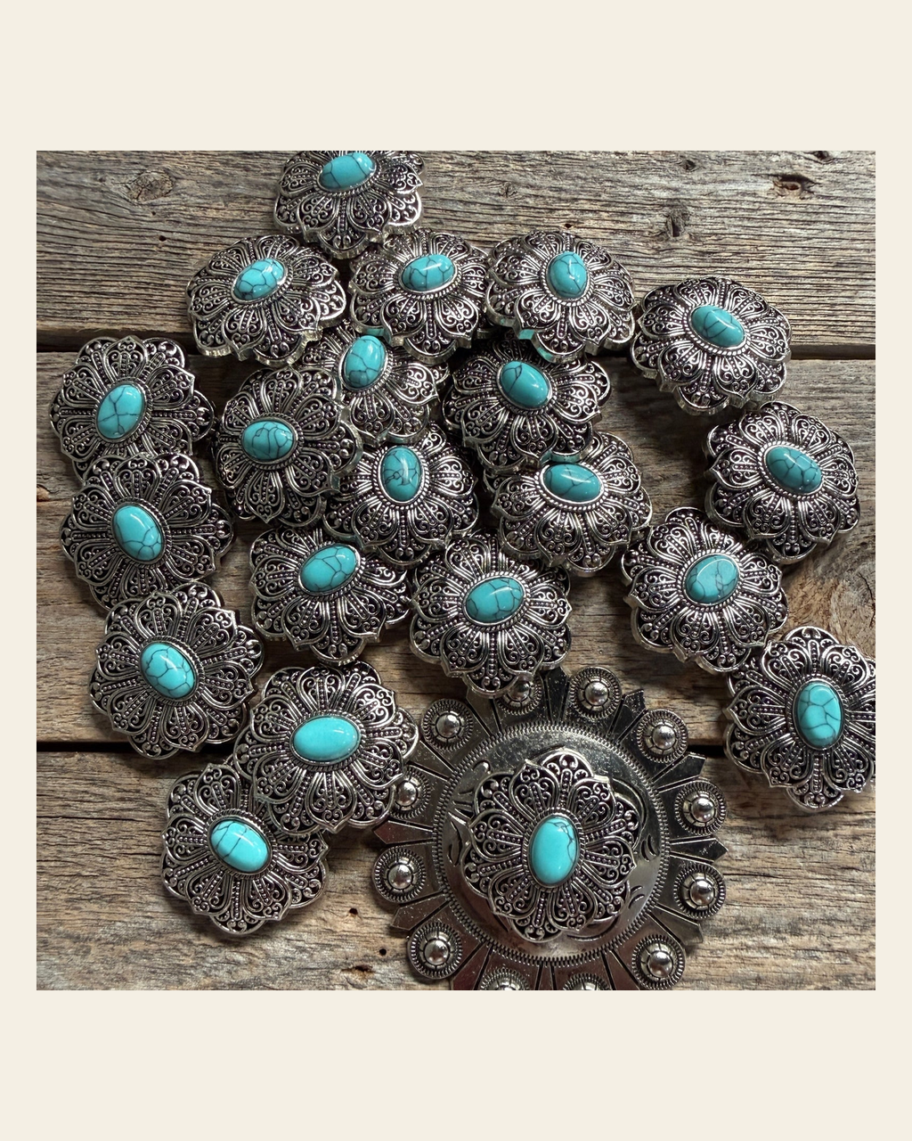 Antique Silver Filigree Floral Turquoise Western Concho W234 on a warm cream background