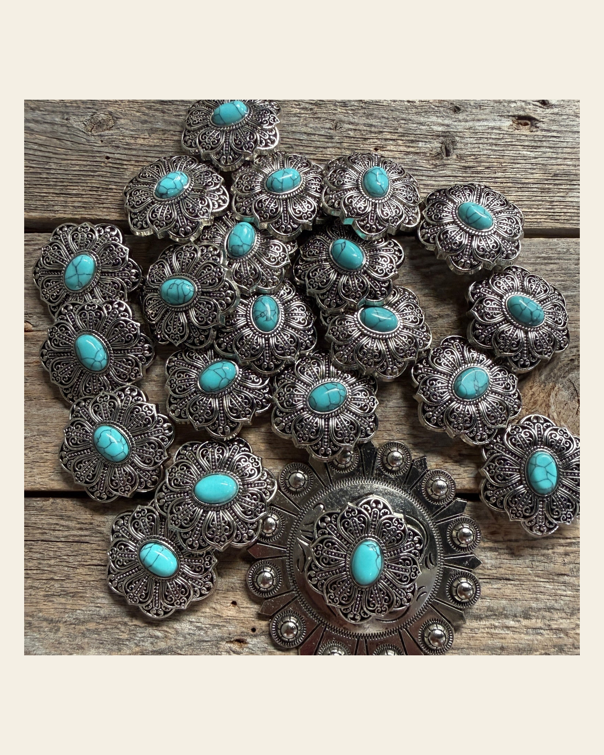 Antique Silver Filigree Floral Turquoise Western Concho W234 on a warm cream background