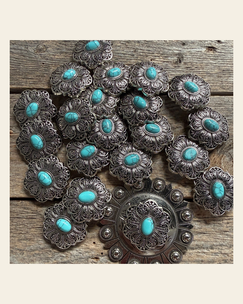 Antique Silver Filigree Floral Turquoise Western Concho W234 on a warm cream background